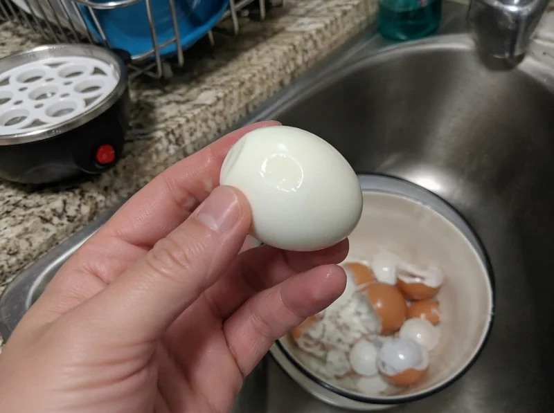 Joyhnny steaming eggs on a kitchen counter